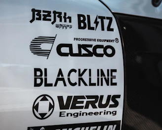 A collage showing logos and snapshots representing each of the eight subsidiaries.