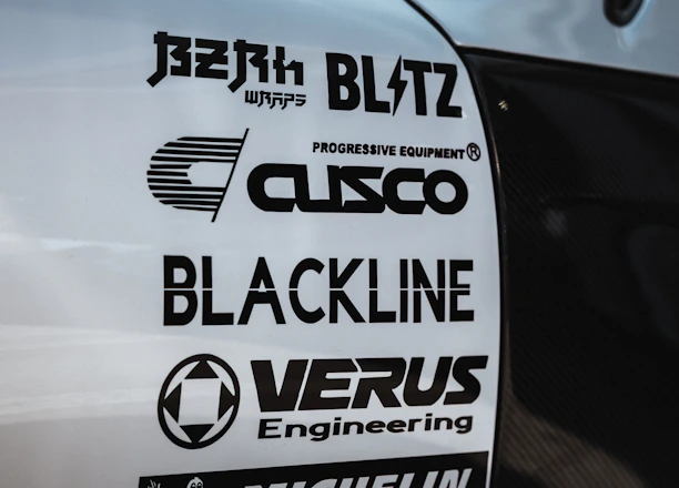 A collage showing logos and snapshots representing each of the eight subsidiaries.